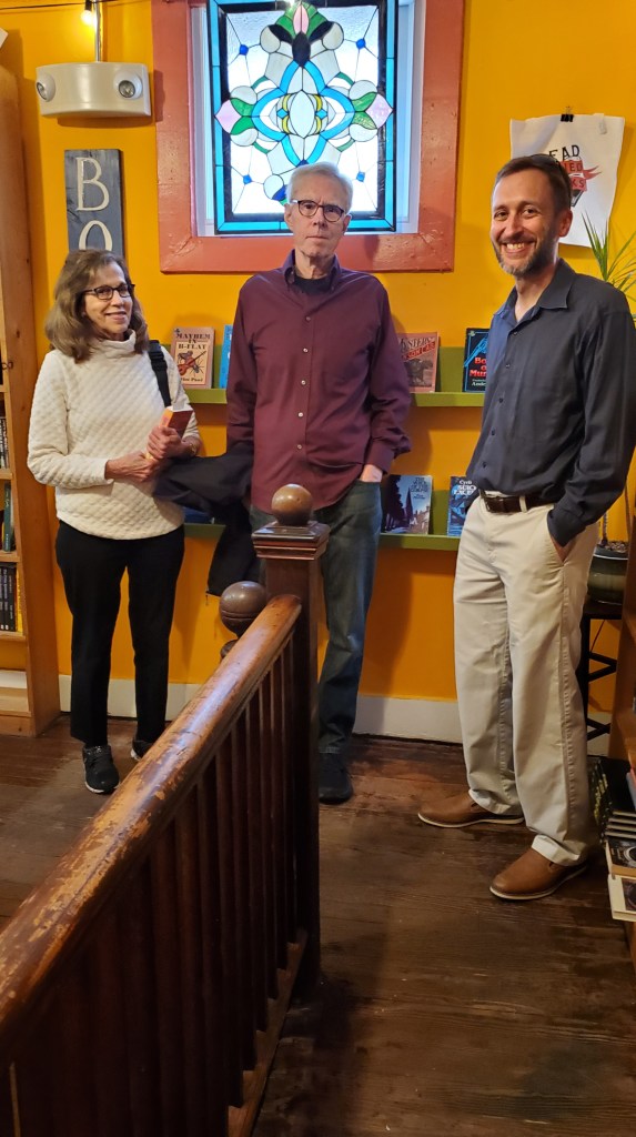 Chris Pickett speaking with friends